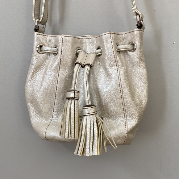 Tignanello leather crossbody purse with tassels. - Picture 4 of 13